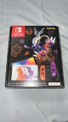 NINSWITCH OLED POKEMON SCARLET & VIOLET