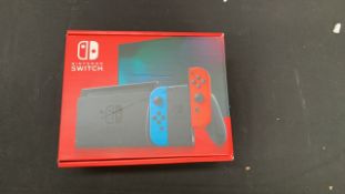NINTENDO SWITCH CONSOLE RED/BLUE