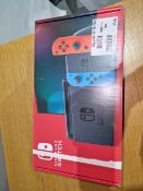 NINTENDO SWITCH NEON + MARIO KART 8 BUND