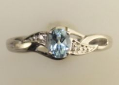 9ct White Gold Fancy Cluster Diamond And Blue Topaz Ring (BT0.50) 0.01 Carats