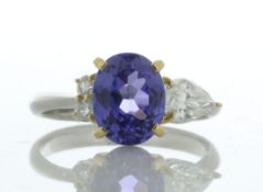 Platinum Cluster Diamond And Oval Tanzanite Ring (T2.29) 0.55 Carats