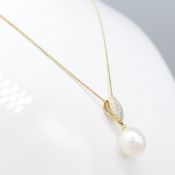 Cultured pearl and diamond dress necklace in yellow gold, boxed