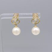 Freshwater pearl and diamond pinwheel droplet earrings in 9ct yellow gold, boxed