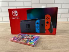 NINTENDO SWITCH NEON + MARIO KART 8 BUND