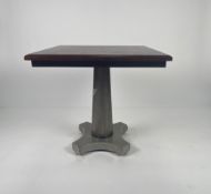 Mahogany square occasional table on a single column with four feet.