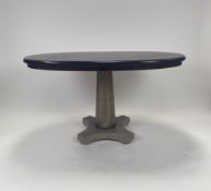 Mahogany Oval Dining Table on a single column with four feet