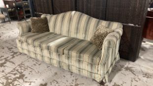 Three seater sofa with two scatter cushions