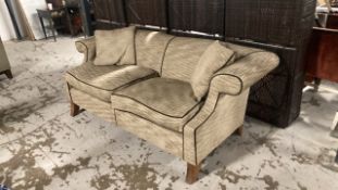 Two seater sofa with two scatter cushions