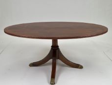 Oval Table with Decorative Brass Feet