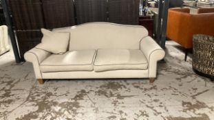 Two seater sofa on timber legs