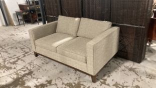 Two seater fabric sofa