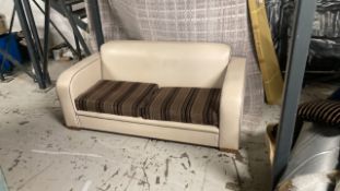 Art Deco style two seater leather sofa