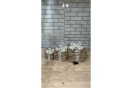 SET OF 3 GOLD AND WHITE PARCELS