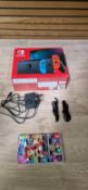 NINTENDO SWITCH NEON + MARIO KART 8 BUND
