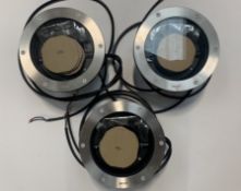 Trio of floor spotlights