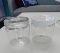 103 full, unopened boxes of jars (24,102 units) and 27 full boxes, and 2 part boxes of lids (24,450