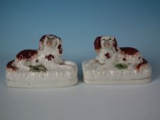 Pair Victorian Staffordshire Pottery recumbent spaniel inkwells