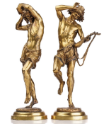 Albert Ernest Carrier-Belleuse (1824 - 1887), A pair of gilt bronze figures of Neapolitan Musicians.