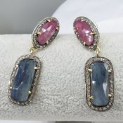Articulated Pair Of Large 26.77 Carat Red & Blue Sapphire Drop Earrings In Gold Plated Silver