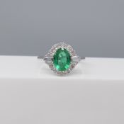 A Certificated Emerald & Diamond Dress Ring Is 18ct White Gold