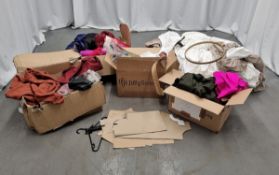 5 boxes of spare material and a dressmakers' pattern board