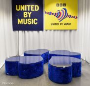 4x Asymmetrical heart shaped blue fur-covered wooden tables from countries' seating area