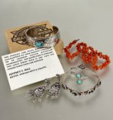 A red coral thong necklace with barrel fastening,  (L x 18 cm), a Native American sterling silver