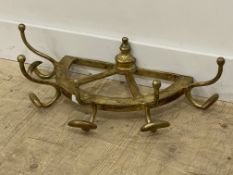 A cast gilt metal demi lune coat rack, with five branches W65cm.