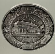 A 19thc relief cast white metal medal for the Bombay Gymkhana founded 1875, awarded in 1879 to T
