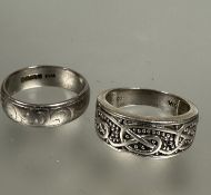 A 18ct white gold engraved ring,T, 7.9g and a 9ct white gold Celtic knot cuff style ring, Q/R, 6.2g.