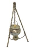 A Victorian silver plated witch’s cauldron spirit burner