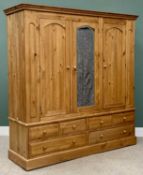 GOOD MODERN PINE TRIPLE WARDROBE - having a central mirrored door and twin outer doors, with