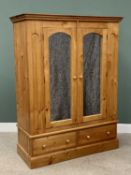 GOOD MODERN PINE DOUBLE MIRRORED DOOR WARDROBE - on a two drawer plinth base, 195cms H, 150cms W,