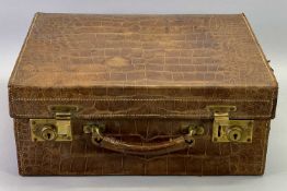 CROCODILE SKIN CASE - 19th Century with gilded brass locks and clasps, 16cms H, 41cms W, 33cms D