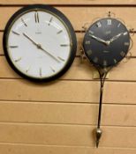 WALL CLOCKS (2) - a Schatz Elexacta swinging wall clock, 54cms inc adjustable pendulum and a