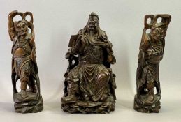 CHINESE CARVED HARDWOOD FIGURE OF A SEATED EMPEROR READING & HOLDING HIS BEARD, 32cms H and two