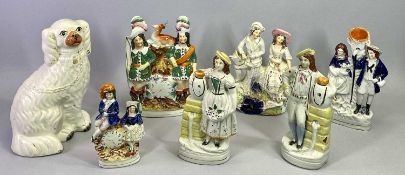 19TH CENTURY STAFFORDSHIRE PAIR OF FLATBACK FIGURES - a man and woman with ewes and flowers standing