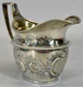 GEORGE III MILK/CREAM JUG - London 1800, Maker Paul Storr, having a foldover upper rim and gilt