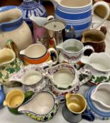 VICTORIAN STONEWARE & LATER JUG COLLECTION, German salt glazed ewer with mask head spout and moulded