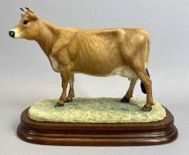 BORDER FINE ARTS LIMITED EDITION FIGURE - 97/1250, Jersey Cow, on wooden stand, 17cms H, with
