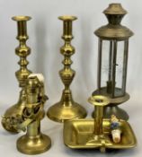 BRASS SHIP'S CANDLE SCONCE, late 19th century on wall mounted gimbal bracket, the base weighted