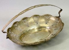 SWING HANDLE SILVER BREAD BASKET - Birmingham 1927, Maker Samuel M Levi, having a lobed upper rim