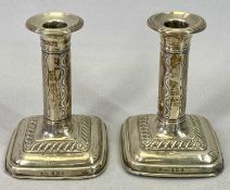 LOADED BASE CANDLESTICKS, A PAIR - Birmingham 1907, Maker, possibly, Edward J Carnelly, both