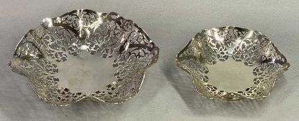 PIERCED SILVER SWEETMEAT DISHES (2) - Birmingham 1937, Maker S M Levi Ltd, having raised shaped