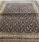 MODERN INDIAN KAIMURI GARDEN CARPET, stylized navy blue floral field within trellis compartments,