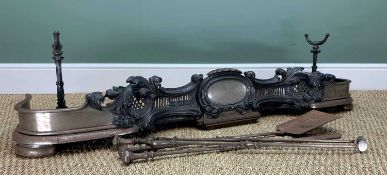 VICTORIAN STEEL ROCOCCO FORM FENDER, with two slot-in arms, and set of 19th century steel fire