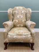 EARLY 18TH CENTURY-STYLE MAHOGANY WINGBACK ARMCHAIR, back with raised scrolled cresting above deep