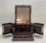 CHINESE HONGMU PORTABLE TOILET BOX, with brass handles, clasps and locks, the hinged top fitted with