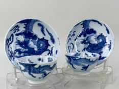 PAIR CHINESE BLUE & WHITE PORCELAIN 'DRAGON' TEABOWLS & SAUCERS, late Qing dynasty, each painted