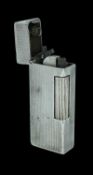 ALFRED DUNHILL VINTAGE STERLING SILVER 'ROLLALITE' LIGHTER, London 1954, liquid fuel filled,